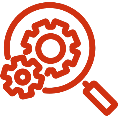 A magnifying glass inspecting parts